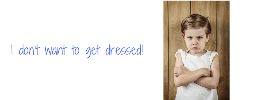 "I don't want to get dressed" and picture of child with arms crossed looking mad