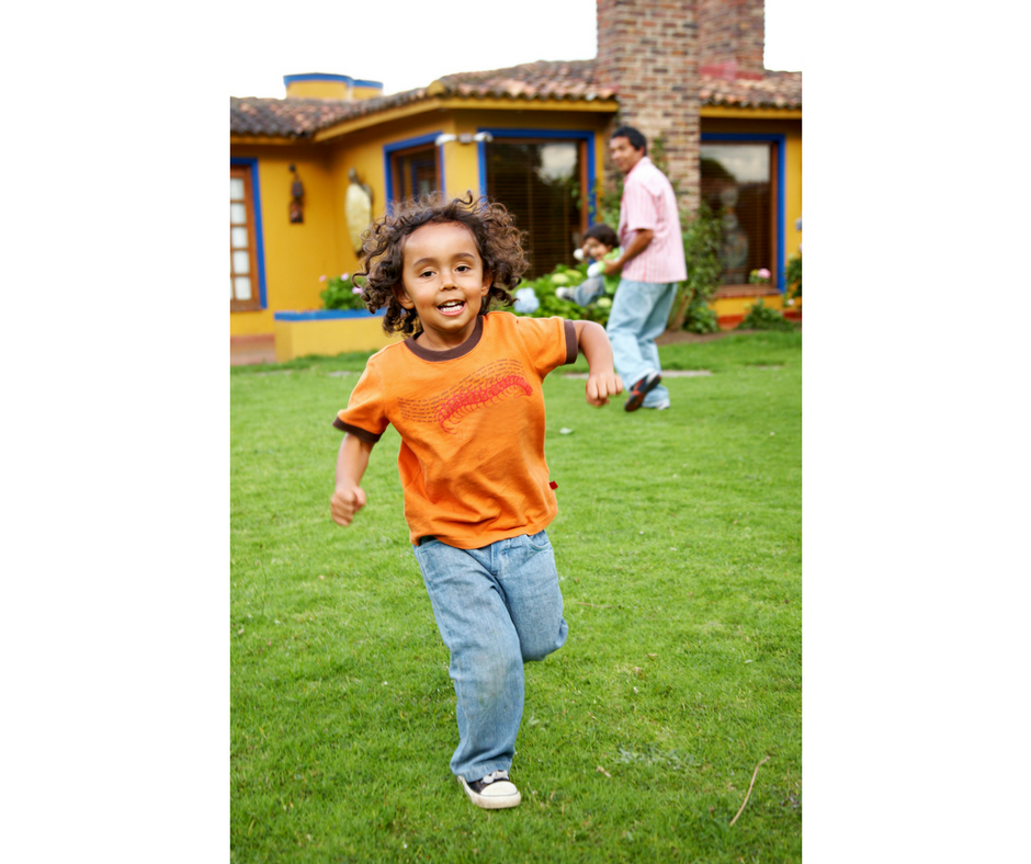 child running in the backyard