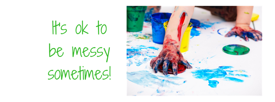 "its ok to be messy sometimes!" and picture of child's hands with paint