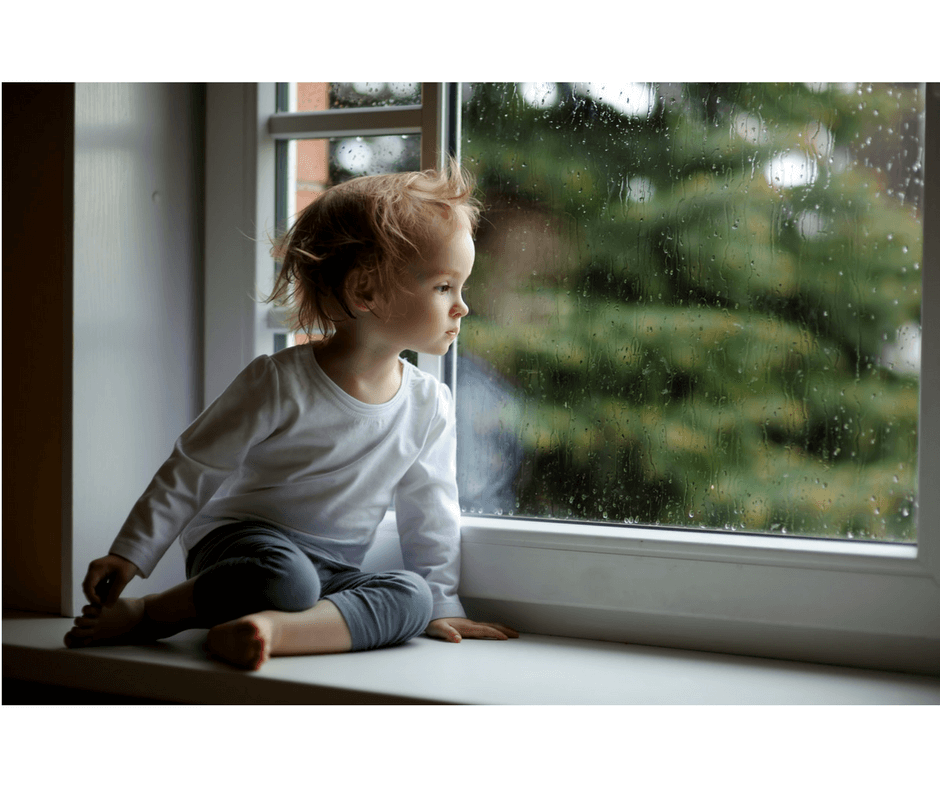 toddler looking out the window