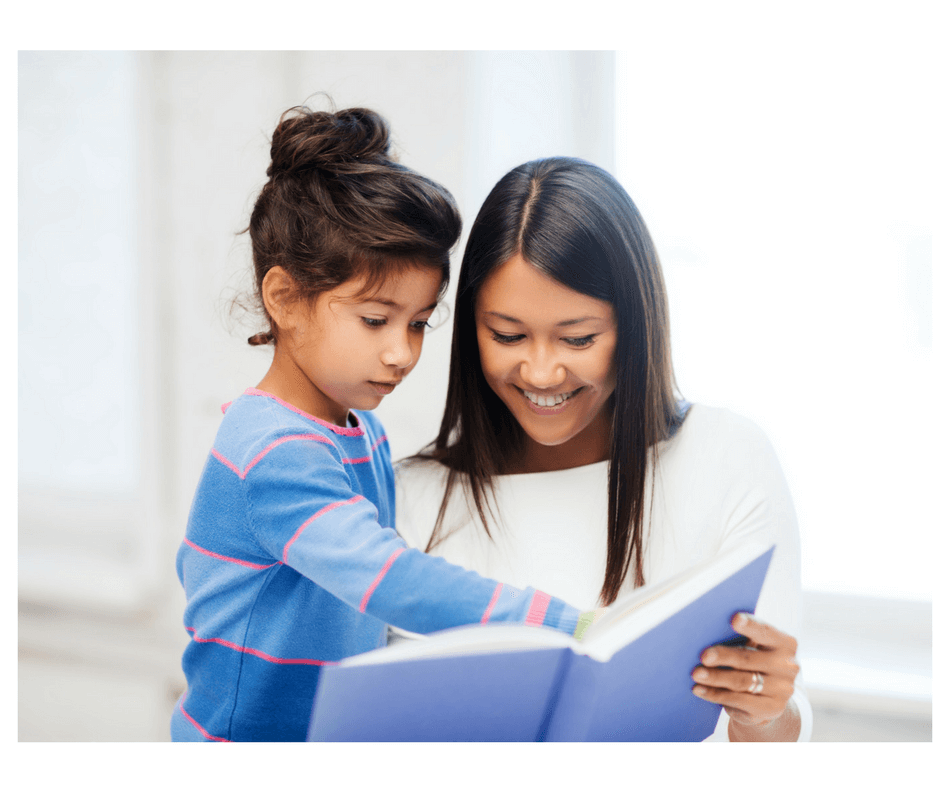 mother and child reading book together