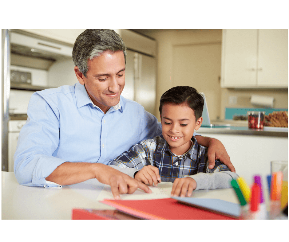 father and child making book together