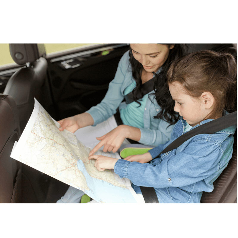 mom and daughter in the looking at a map qhile waiting to get to their destination