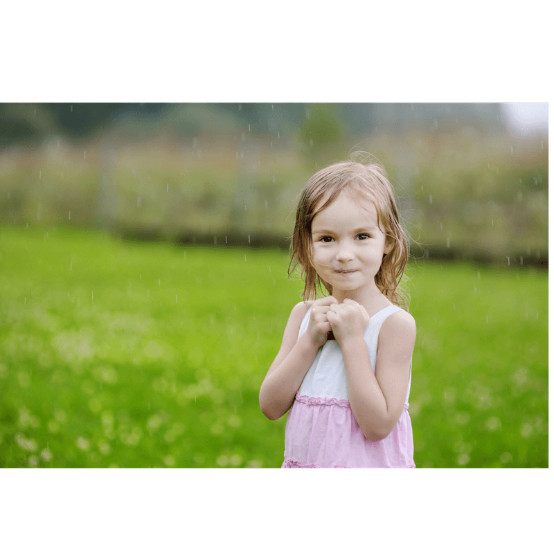 girl in the rain at the park