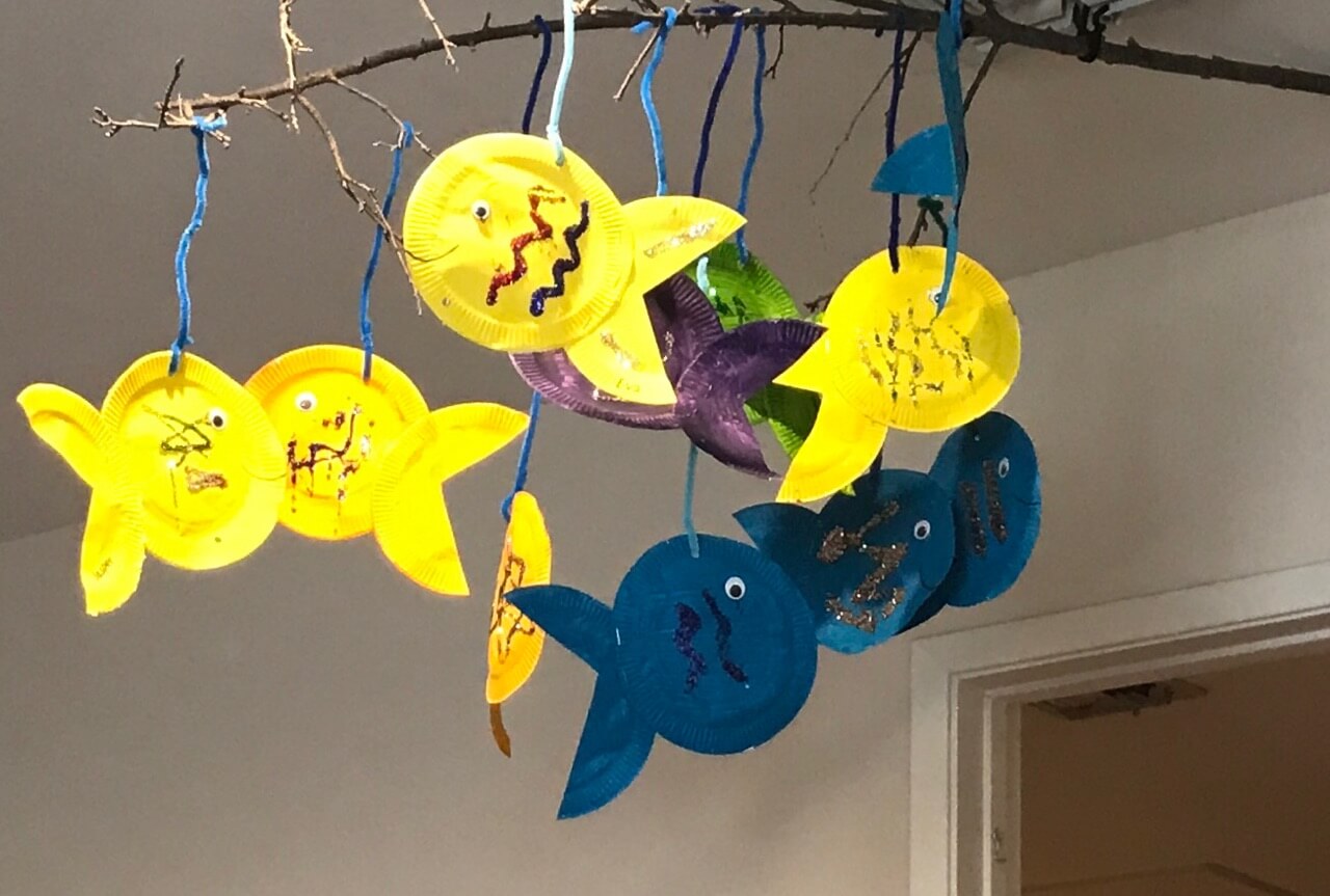 fish hanging from ceiling at Early Childhood Development Associates's class