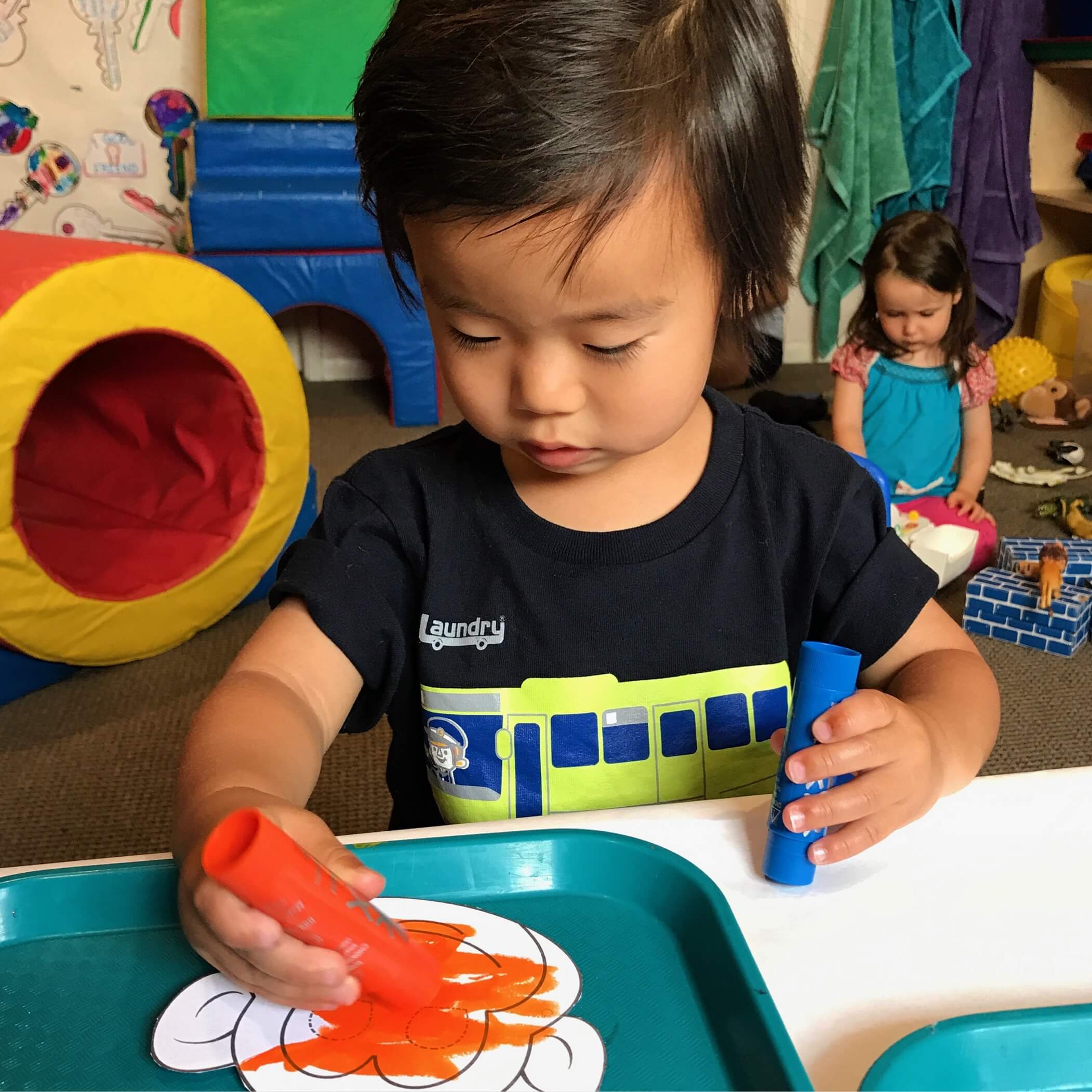 child making zoo hat at Early Childhood Development ASsociates' class