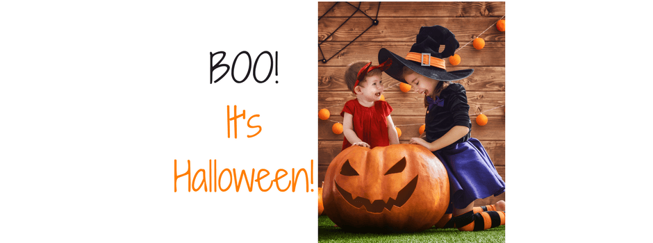 Phrase "BOO! It's Halloween" and picture of 2 toddlers playing with a huge pumpkin