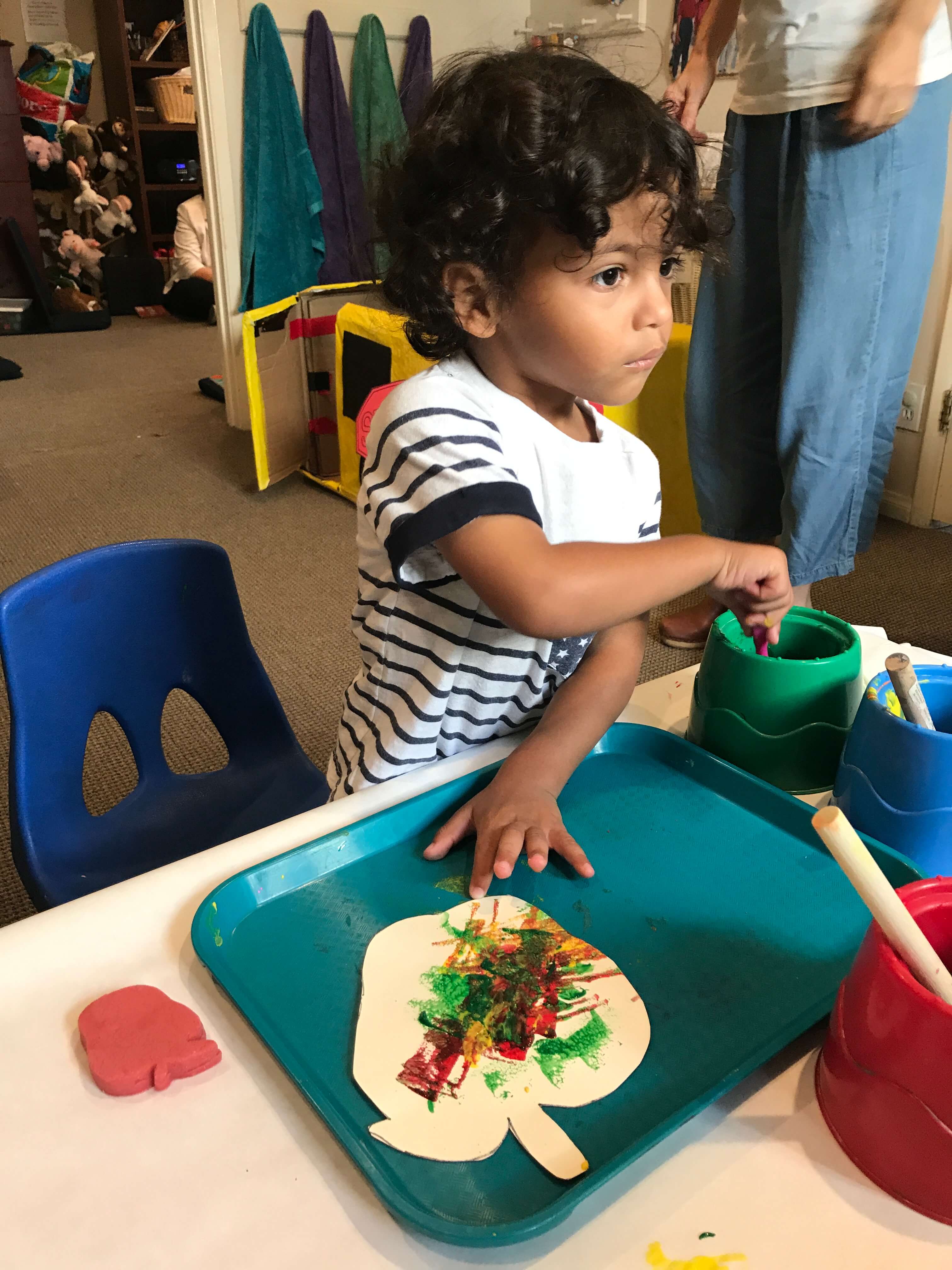 toddler sponge painting at ecda's class