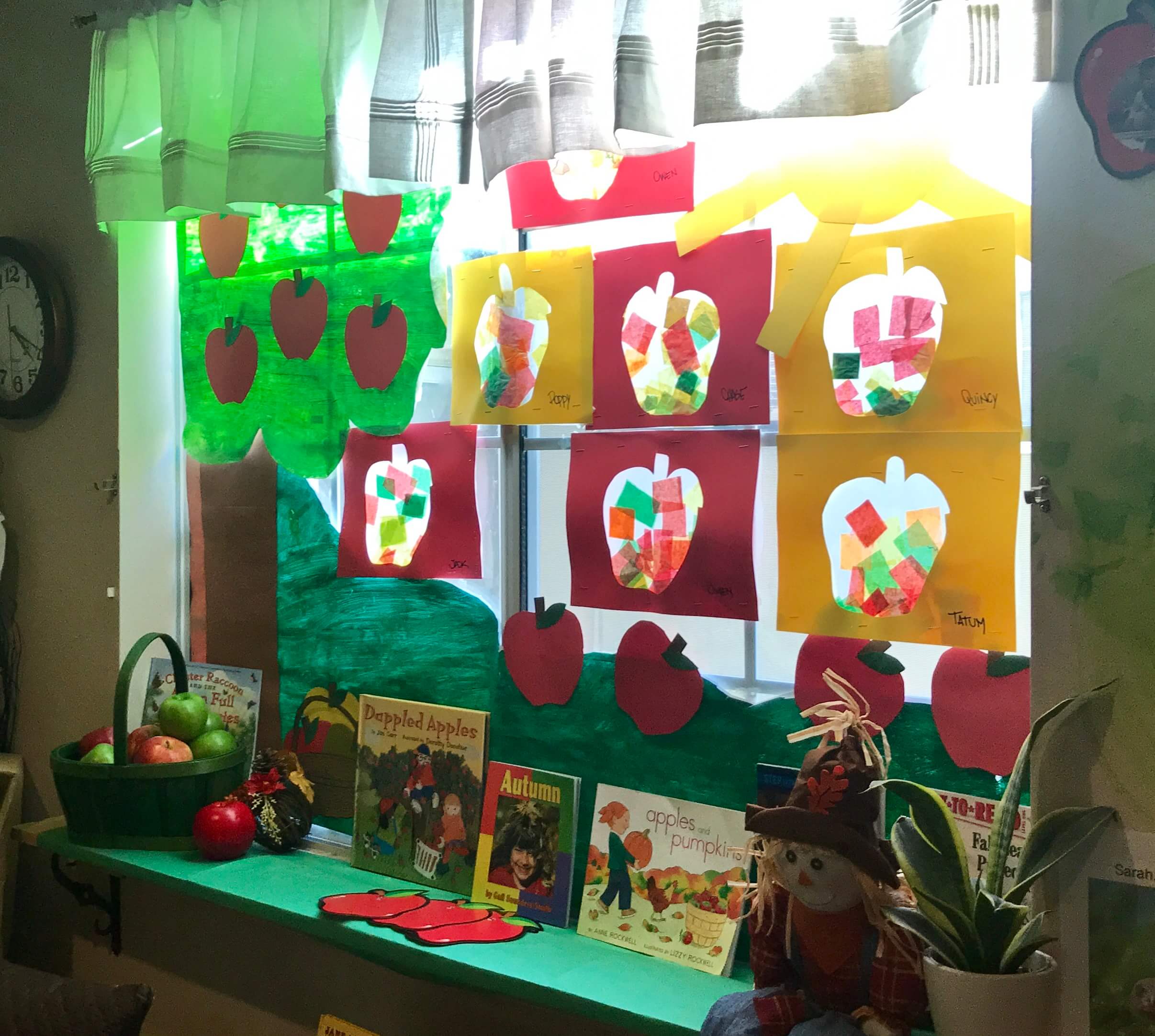 ecda's window with art projects made from the kids