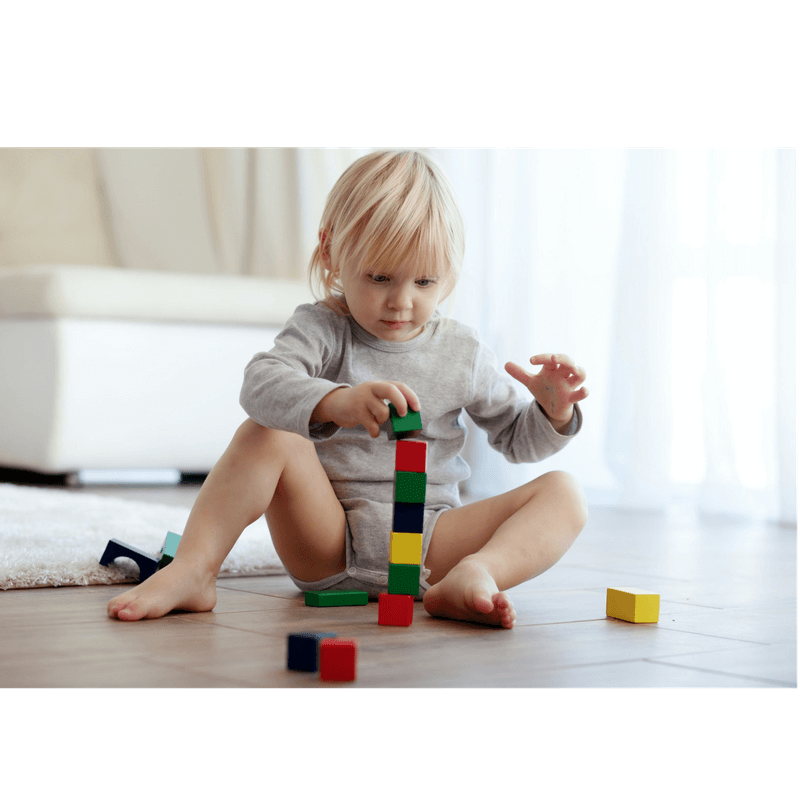 toddler stacking woden blocks