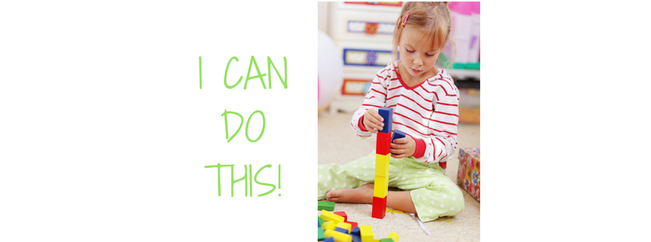 "I can do this!" phrase and picture of child playing with bricks